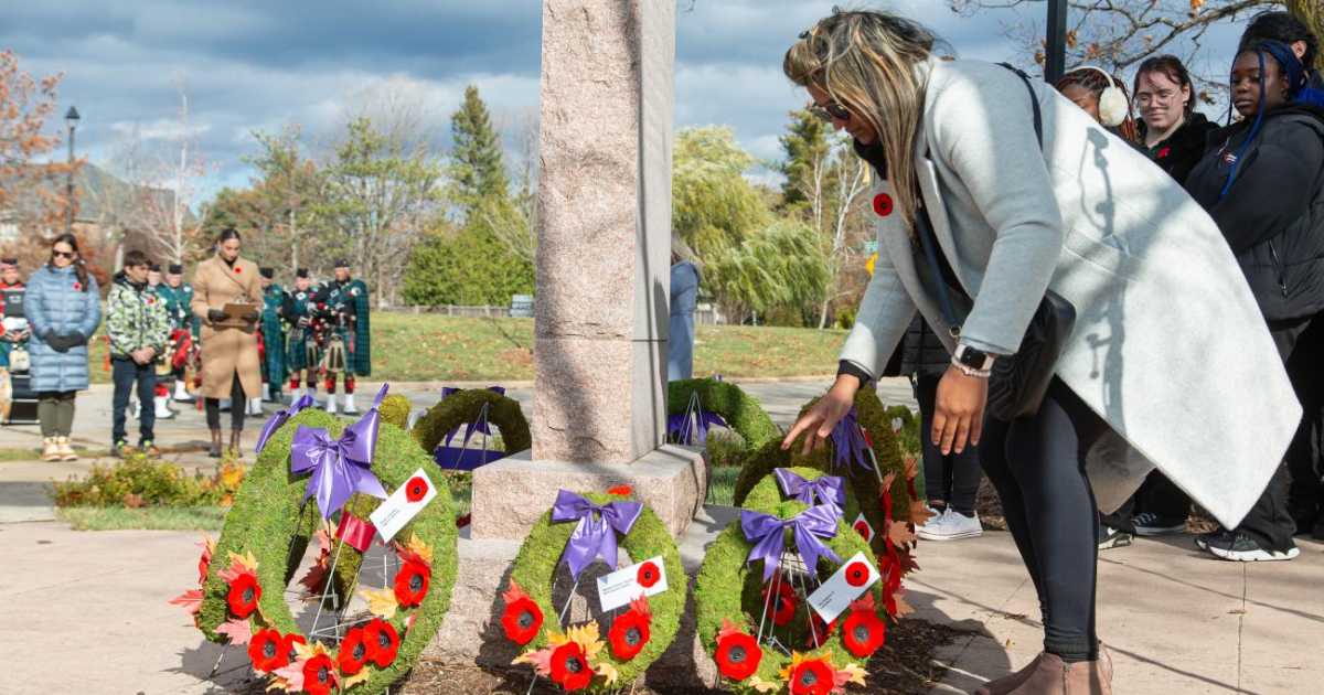 Jessica McGregor, executive member of Region 4, lays a wreath at Town of Caledon's Remembrance Day ceremony. 