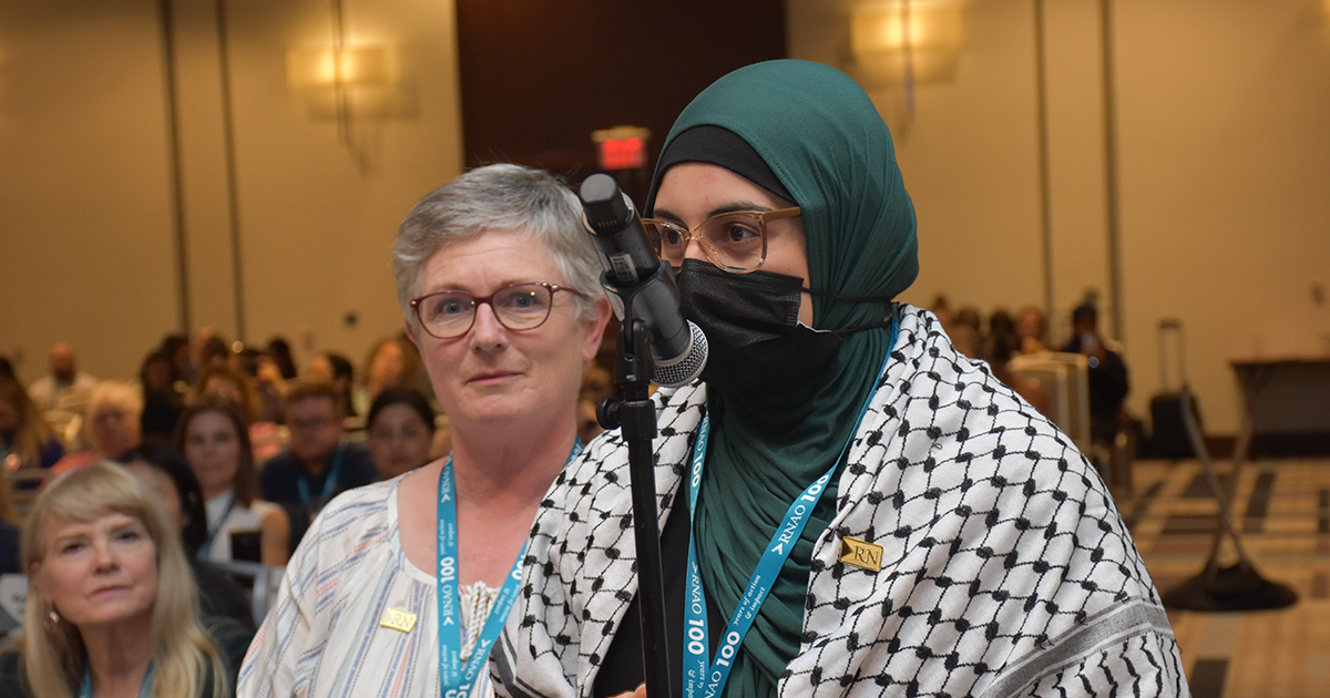 Member Amina Al Rohani speaks on the resolution to provide interpretation services for refugees in health-care settings. The resolution was one of 12 that were approved by consultation representative. 