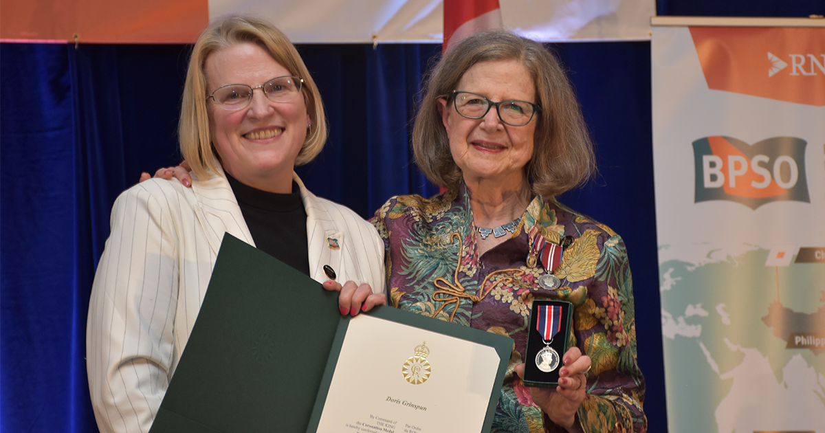 Minister of Health Sylvia Jones presents Grinspun with the King Charles III coronation medal in honour of her service to Ontario.  