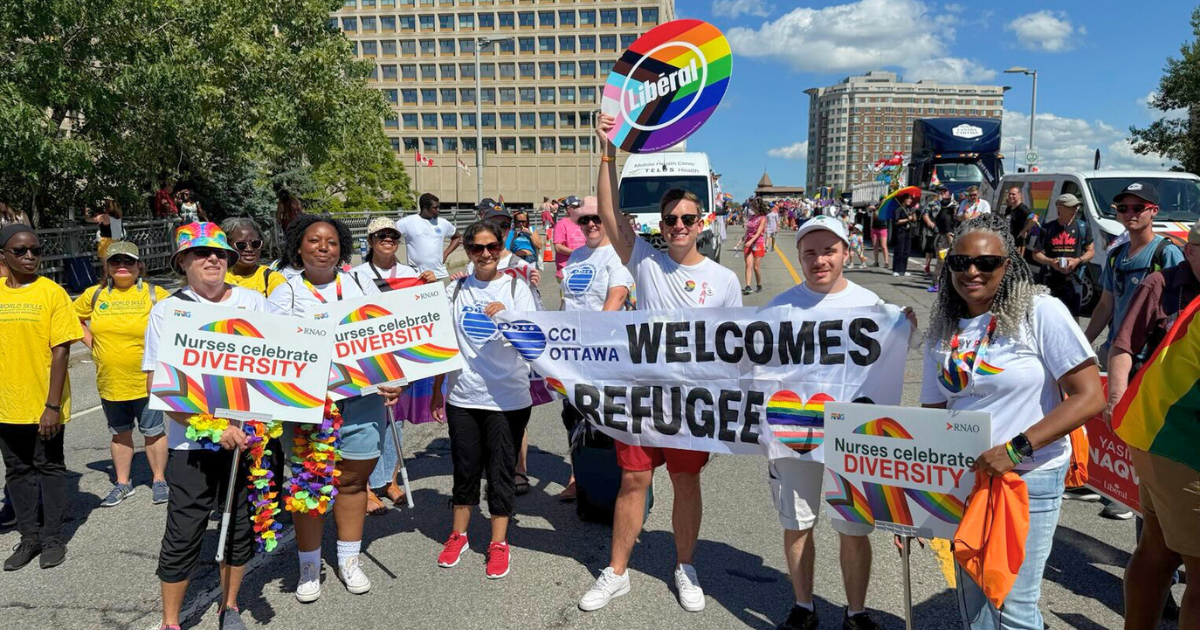 2025 Ottawa Pride 3  with Ottawa with Liberal MPP, RNAO member & RN Tyler Watts.png 