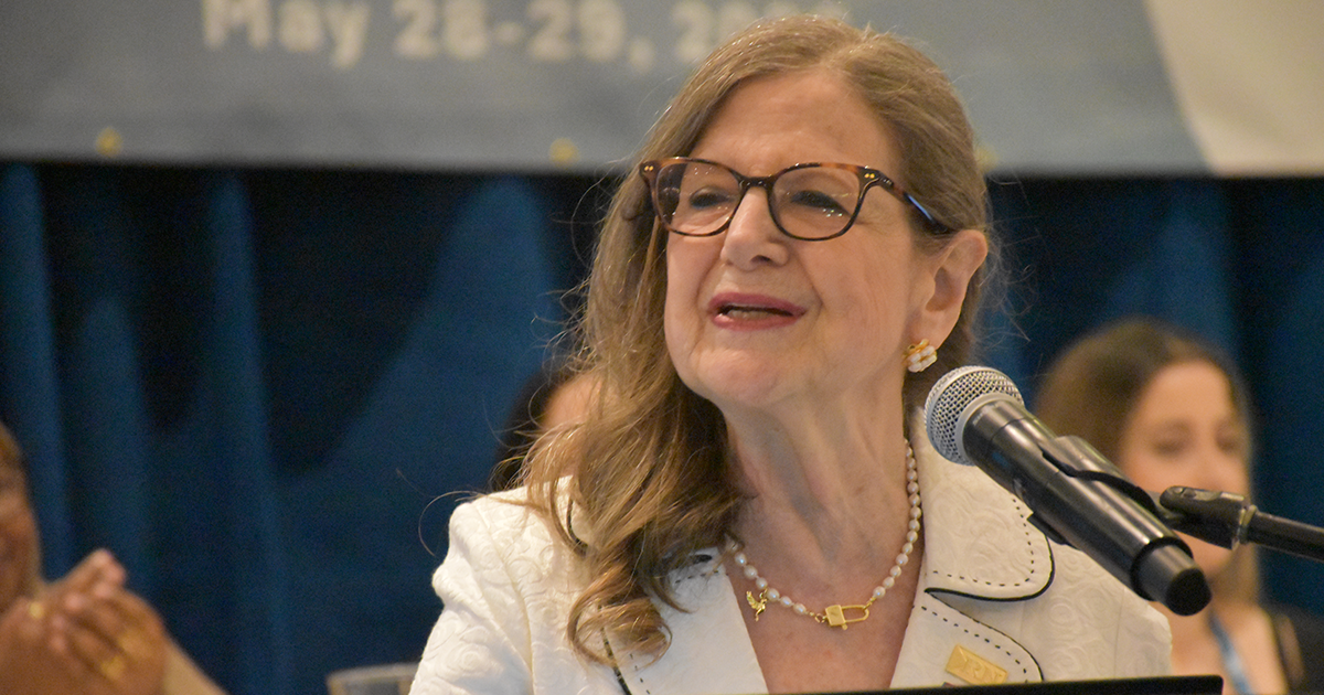 RNAO CEO Dr. Doris Grinspun speaks, pictured at the AGM podium on May 29, 2026. 