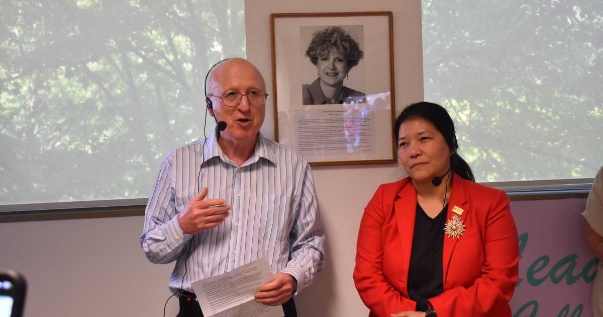 Dr. Ricardo Grinspun and then-President NP Lhamo Dolkar unveil the Leading Change collaborative space and congratulate its namesake Dr. Doris Grinspun (pictured in a frame behind them).  