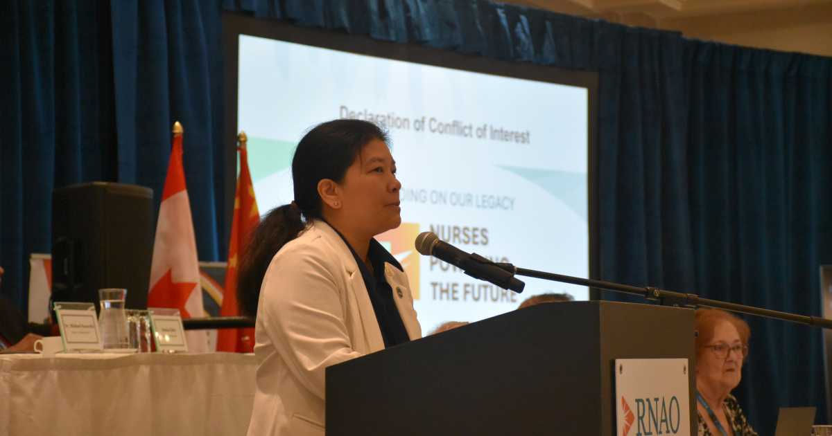 Outgoing RNAO President Lhamo Dolkar in reflection on her presidency at the podium at RNAO’s 101st AGM on May 29, 2026. 