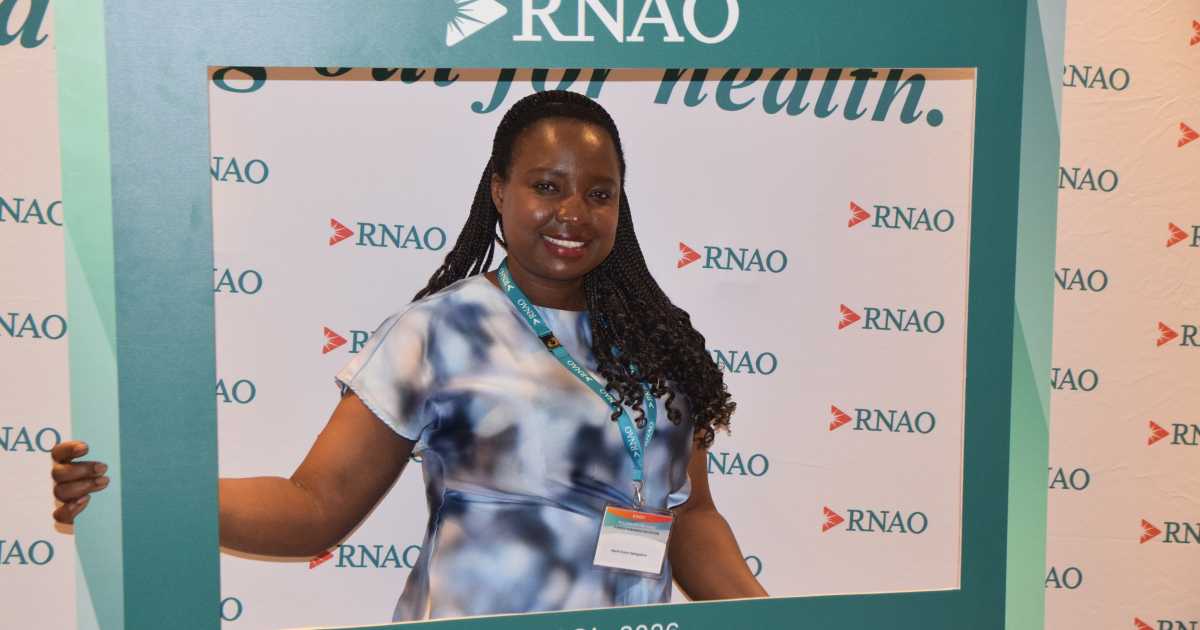 RNAO member Marie Claire Uwingabire in front of our Step and Repeat at RNAO’s 101st AGM on May 29, 2026. 