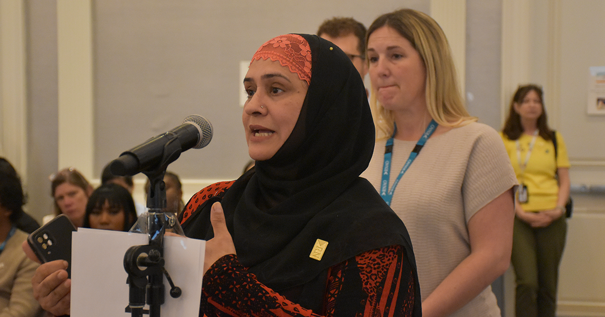 RNAO member at the microphone during the AGM consultation session.  
