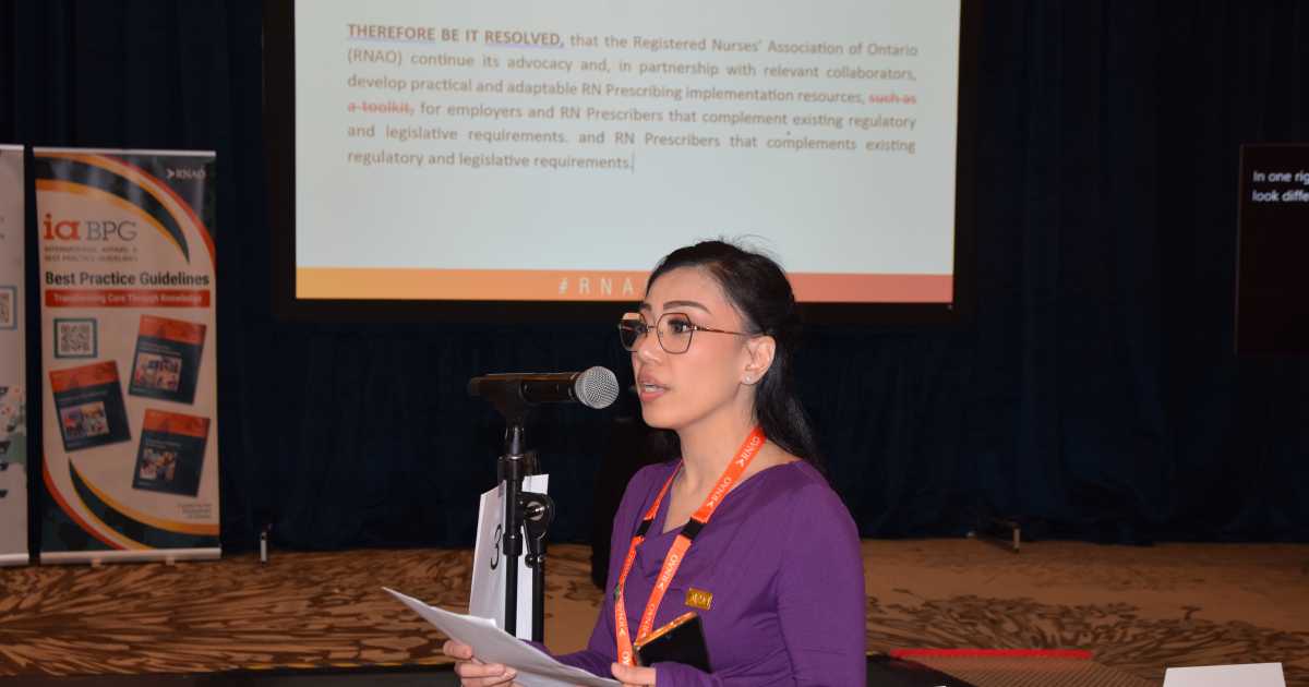 RNAO member and RN Ruby Amoncio speaks to a member resolution during the consultation session at the 101st Annual General Meeting on May 29, 2026.  