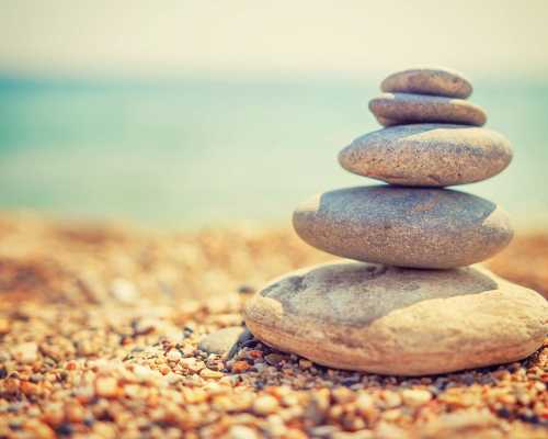 Stones stacked by the sea